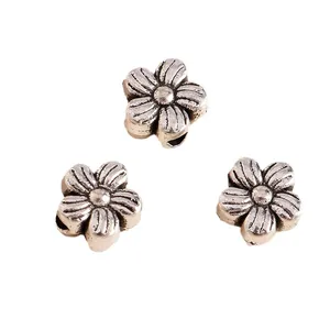 Three vintage silver plum blossom charms made of antique alloy for DIY jewelry