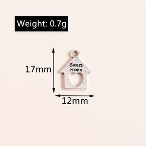 Detailed view of hollow house charm with Sweet Home engraving and 17x12mm measurements