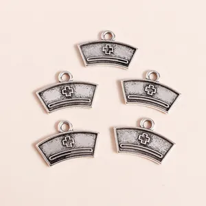 Retro silver alloy nurse hat pendants with cross symbol for DIY jewelry making