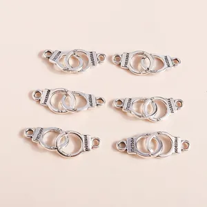 Set of silver alloy handcuffs freedom charms with engraved lettering for DIY jewelry