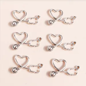 Set of six heart stethoscope charms in antique silver alloy for medical jewelry DIY