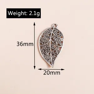 Detailed view of vintage silver alloy leaf pendant with 36mm x 20mm dimensions