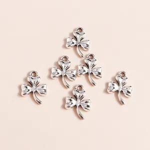 Set of six minimalist clover pendants in plated alloy for DIY jewelry crafting accessories