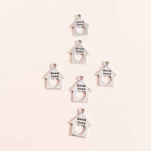 Antique silver house pendants with Sweet Home engraving and heart cutout design