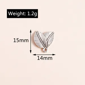 Macro view of twin leaf alloy pendant with silver finish and vein detail measurements