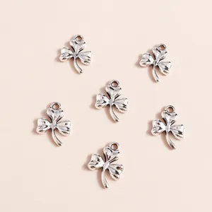 Pack of 30 minimalist clover alloy charms in antique silver finish for DIY jewelry making
