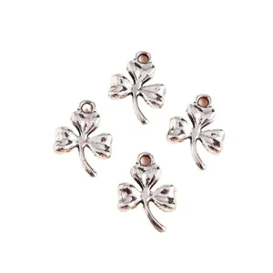Set of four vintage silver clover leaf pendants for DIY jewelry and necklaces