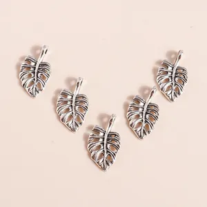 Retro antique silver monstera leaf pendants with hollow texture for DIY jewelry making