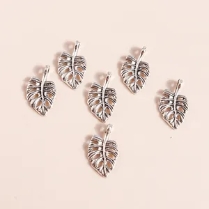 Set of 6 vintage silver monstera leaf charms in plated alloy with detailed vein textures