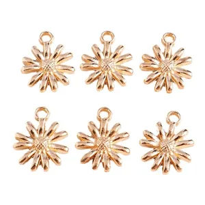 Pack of six golden daisy flower alloy pendants for jewelry making DIY projects