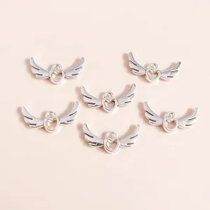 Hollow heart and angel wing alloy pendants in silver for DIY jewelry making