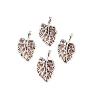 Set of vintage silver monstera leaf pendants with hollow texture for DIY jewelry making