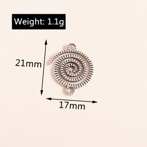Macro detail of a 21mm silver alloy spiral charm pendant with size and weight specs