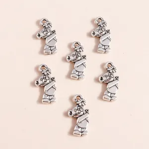 Set of six vintage silver alloy bear charms with flower details for DIY jewelry making
