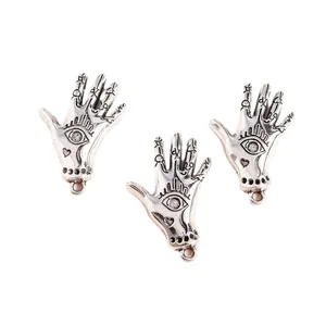 Retro silver alloy palm charms with Hamsa hand design and astrology symbols