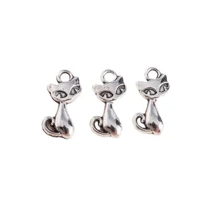 Three vintage silver cat charms for DIY jewelry making with retro alloy finish