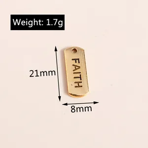 Detalle de un colgante faith de aleación dorada con medidas de 21mm y peso de 1,7g