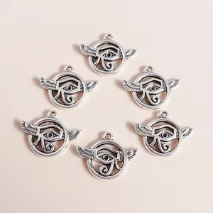 Set of six vintage silver Horus Eye charms with wings for DIY jewelry making