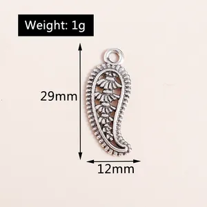 Detail view of vintage hollow leaf pendant showing dimensions 29mm height and 12mm width