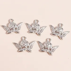 Set of five silver vintage angel alloy pendants with wings and top loops for DIY jewelry