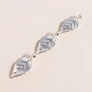 Three silver leaf pendants with detailed vein texture for DIY jewelry making