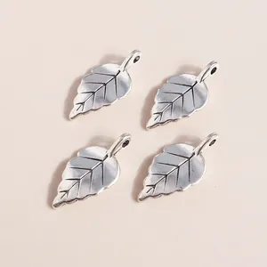 Set of four antique silver leaf pendants made of alloy for DIY jewelry crafting