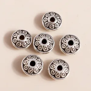 Flache Vintage-Spacer-Perlen aus Silberlegierung mit Relief für DIY-Schmuckherstellung