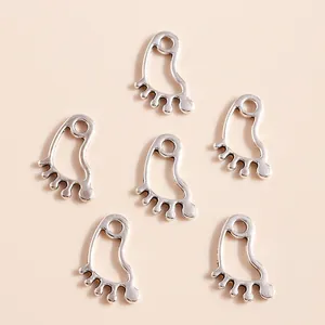 Bulk pack of vintage silver alloy baby footprint charms for DIY jewelry and necklaces