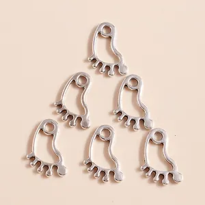 Set of 6 hollow footprint pendants in antique silver alloy for DIY jewelry making