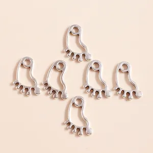 Set of six hollow footprint charms in polished silver finish for DIY jewelry making