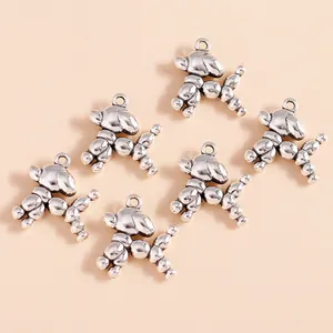 Set of ten vintage silver balloon dog charms made of alloy for DIY jewelry making crafts