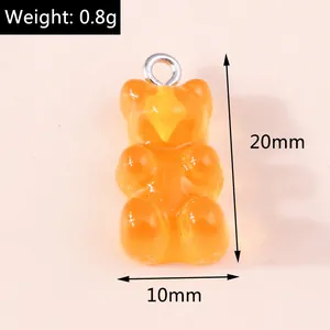 Detail showing weight 0.8g and dimensions 20x10mm for orange resin gummy bear pendant