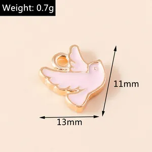 Makroaufnahme von rosa Emaille Friedenstaube Anhänger mit Maßen 11x13mm für DIY Schmuck
