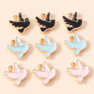 Set mit 9 farbenfrohen Vogelanhängern in Schwarz, Blau und Rosa für DIY-Schmuckherstellung