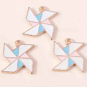 Three colorful windmill charms in gold alloy and enamel for DIY jewelry making