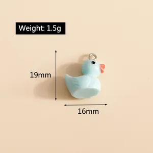 Detailed view of light blue resin duck pendant with dimensions of 19mm by 16mm