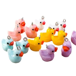 Colorful resin duck pendants with silver jump rings for DIY jewelry making