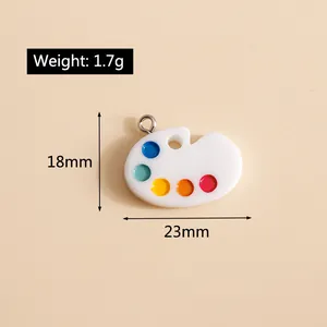 Detail showing dimension and weight of an artist palette pendant for DIY jewelry making