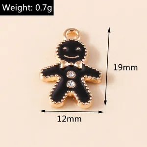 Close-up of black enamel gingerbread man charm with rhinestones and size dimensions