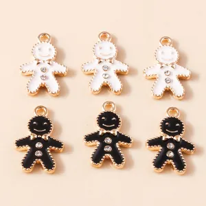Detail of gingerbread man charms with enamel finish and sparkling rhinestones for DIY jewelry
