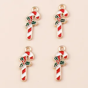 Set of 4 Christmas candy cane alloy pendants with red white enamel and holly leaves