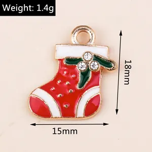 Detail of red Christmas stocking alloy pendant with rhinestones for DIY jewelry making