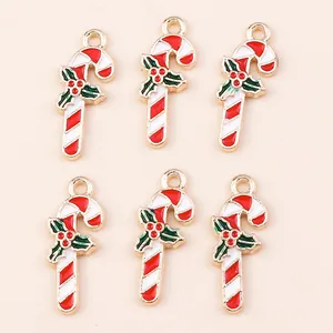 6-piece set of gold-plated Christmas candy cane pendants with red and white enamel details
