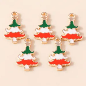 Detailed view of colorful Christmas tree pendants with gold base for DIY jewelry making