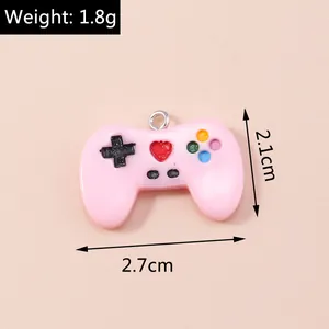 Pink game controller resin charm with dimensions 2.7x2.1cm and 1.8g weight detail