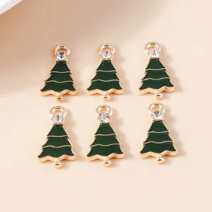 Golden alloy Christmas tree pendants with green enamel and clear zircon stones