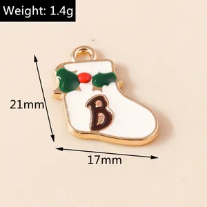 Detail of Christmas stocking charm with letter B showing 21mm by 17mm size and 1.4g weight