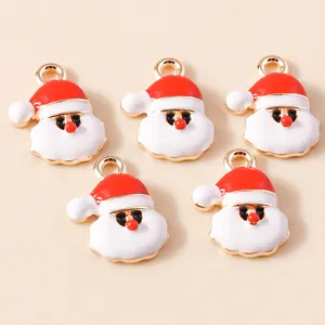 Five Santa Claus enamel metal pendants with red hats and gold trim for DIY jewelry