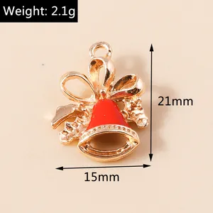 Detail view of 21x15mm red enamel Christmas bell pendant with gold bow and weight info
