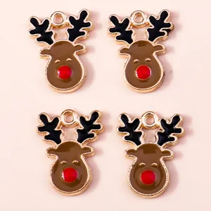 Set of cute Christmas reindeer cartoon charms with red nose and gold finish for DIY crafts